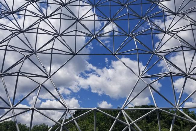 One of my favorite views of Richard Buckminster Fuller’s geodesic dome. It shows the opening that was planned for the Minirail in the United States Pavilion (Expo 67). To me, it’s a symbol of openness to the world!