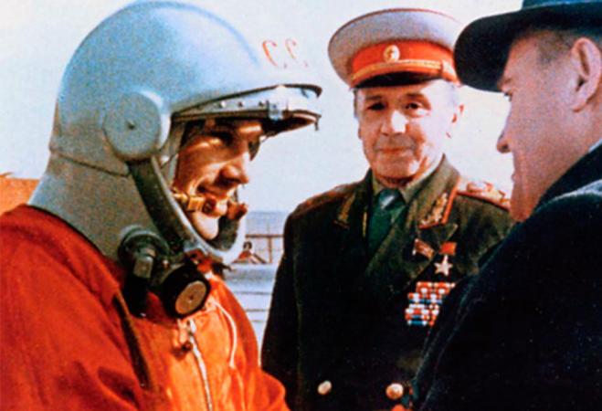 Yuri Gagarin receiving encouragement from Sergei Korolev.