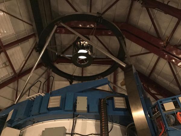 The Magellan Baade Telescope has a primary mirror with a diameter of 6.5 meters, and its mount takes up almost the entire dome space.