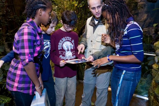 Four students receive instructions for their Amazonian Expedition