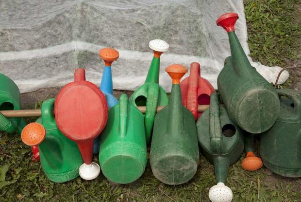 A collection of watering cans.