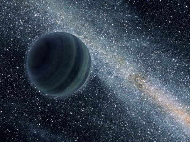 Une vue d’artiste de la planète errante SDSS 1110+0116. On y voit cet objet similaire à Jupiter, mais qui n’est pas en orbite autour d’une étoile, flottant librement dans l’espace avec la Galaxie en arrière-plan. 
